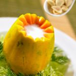 Double boiled whole papaya with almond juice