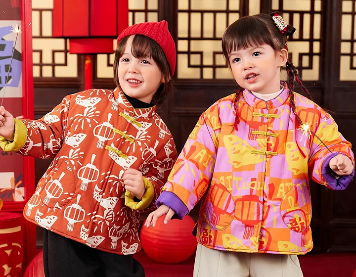 Dipplo"s, kids in tang suits featuring jianzhi cartoon prints.