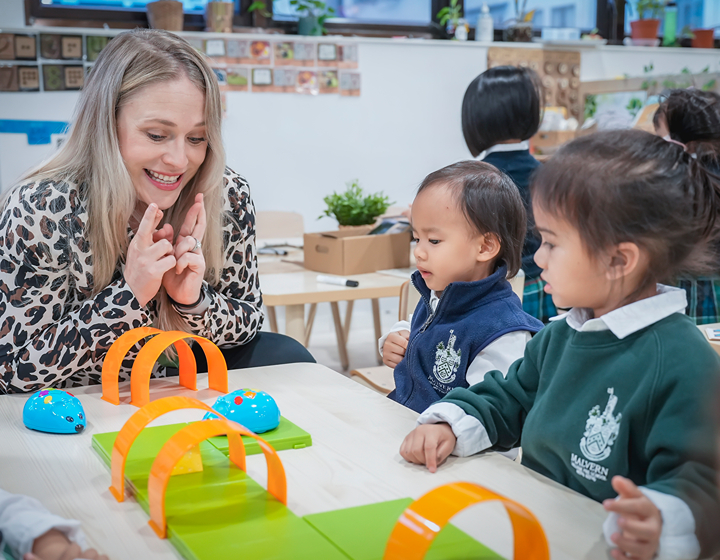 best international kindergartens nurseries and preschools in hong kong: malvern college pre-school hk teacher and students